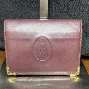 #43 Cartier Leather bidold wallet with Gold Accents
